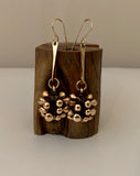 Earrings bronze baubles on forged dangles